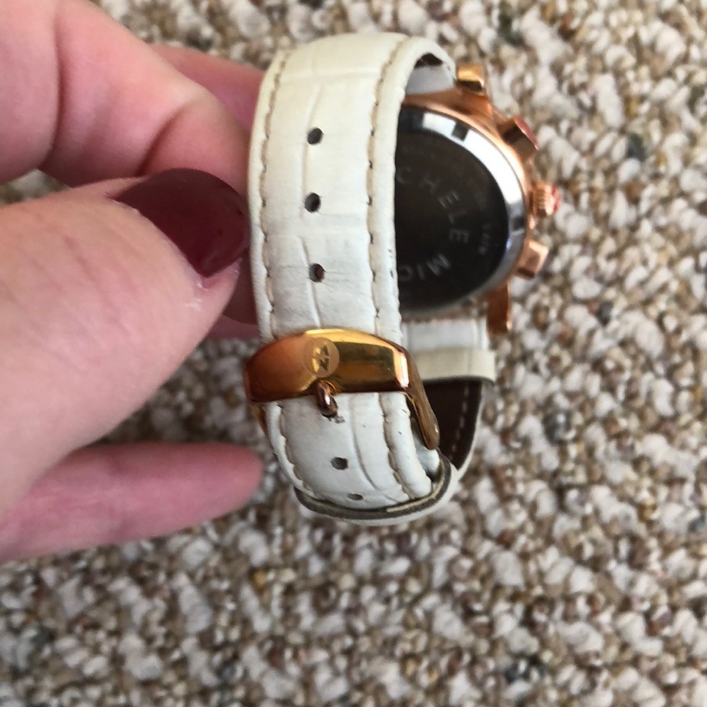 Michele rose gold watch with white leather strap